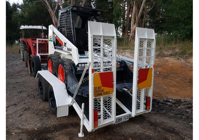 caption Skid steer loader