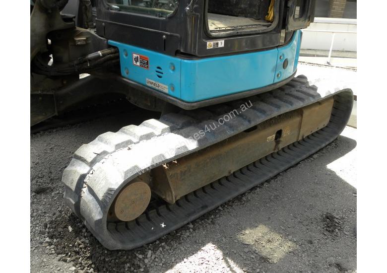 caption TUFFTRAC RUBBER EXCAVATOR TRACKS