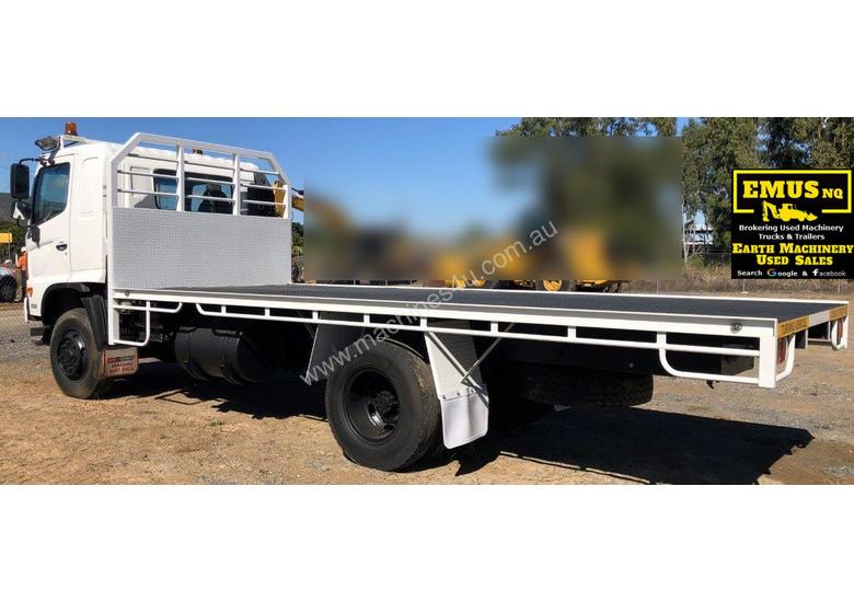 caption 2010 Hino Flat Top Tray Truck, bit over 100k km’s. TS464