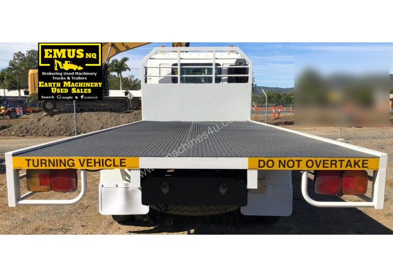 caption 2010 Hino Flat Top Tray Truck, bit over 100k km’s. TS464