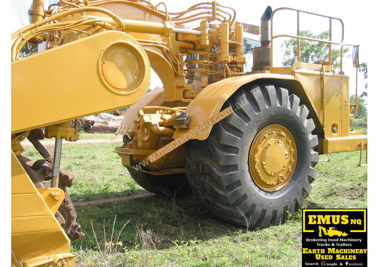 caption 1982 CAT 633D Scraper, near new DI Engine. E.M.U.S. MS524