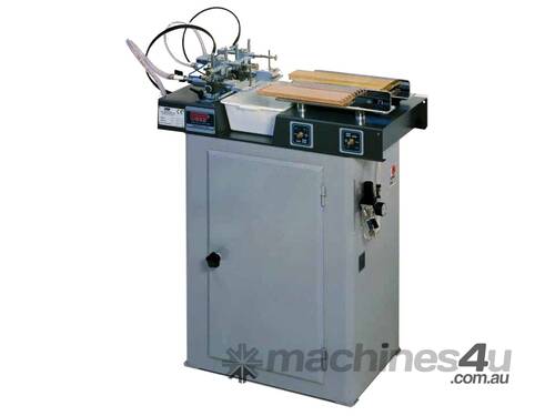 caption Semi Automatic Glue Spreading Machine with Two Heads for Profiles and Joints 9033 by Pizzi