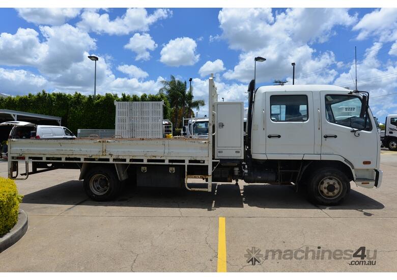 caption 2010 MITSUBISHI FUSO FK 600 - Dual Cab - Tray Truck - Tray Top Drop Sides