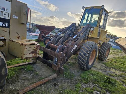 caption CAT IT14B Front End Loader