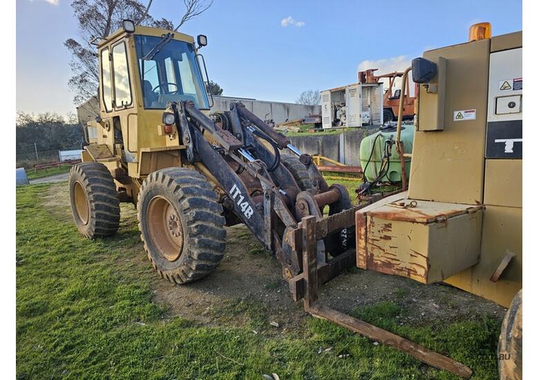 caption CAT IT14B Front End Loader
