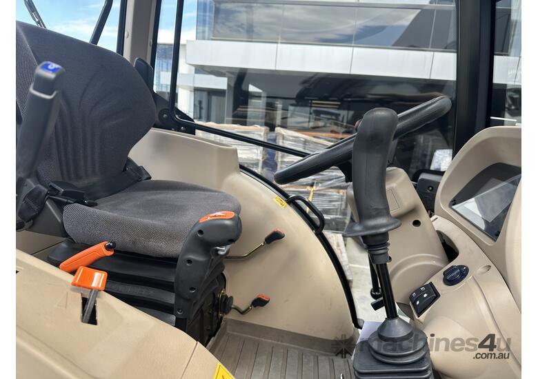 caption TANNERTRACK - LOVOL P4110 110HP Power Shuttle with Loader