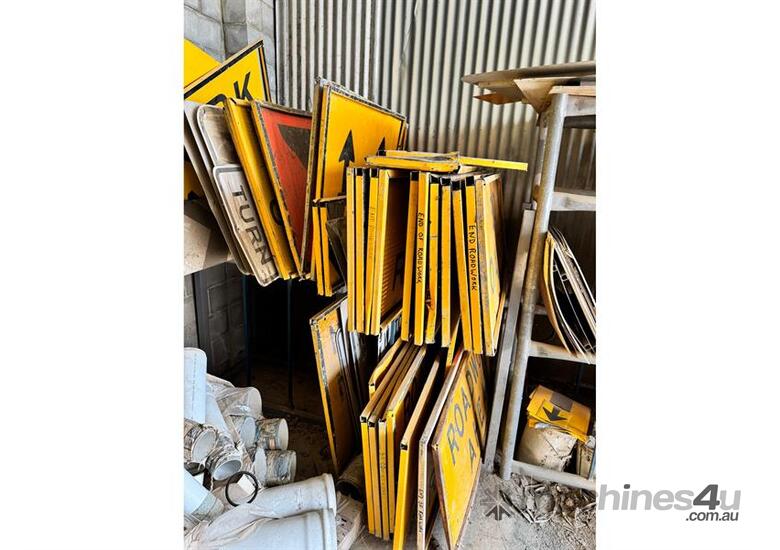 caption HUGE QTY OF ROAD SIGNS ETC