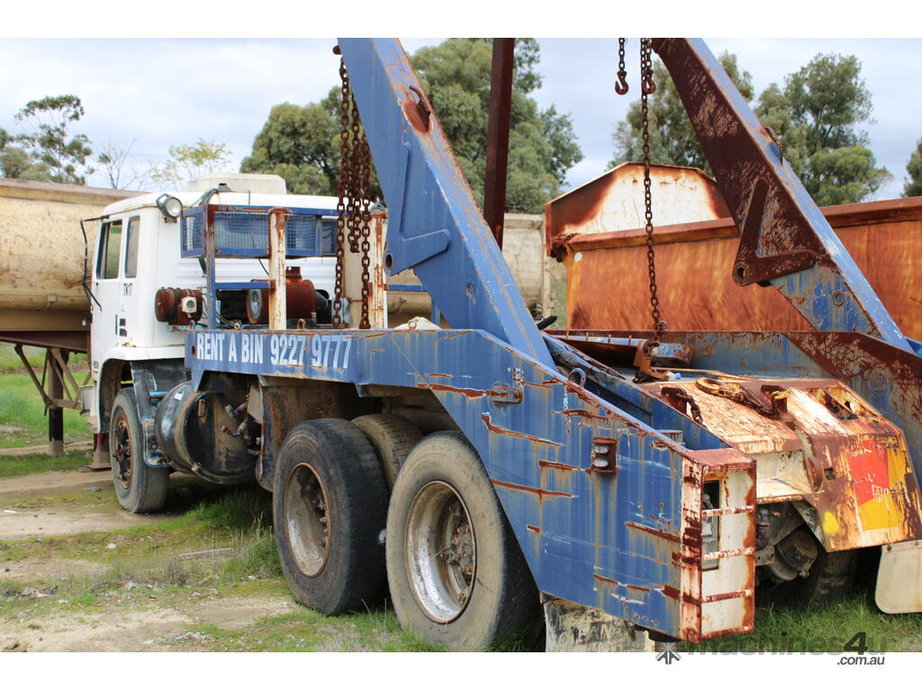 Buy Used acco ACCO 2350F 6X4 CAB CHASSIS WITH MORRELL BIN LIFTER Skip