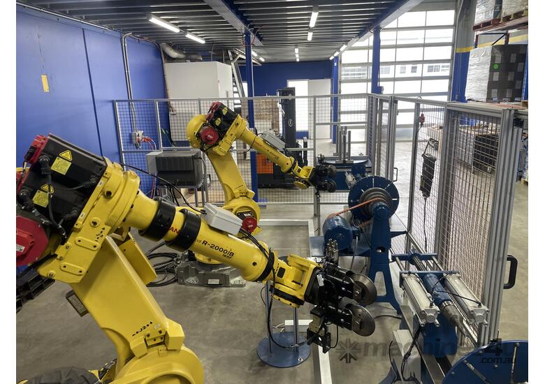 caption Fanuc 165ib Metal Spinning Robot cell - Boost Efficiency and Precision Today!