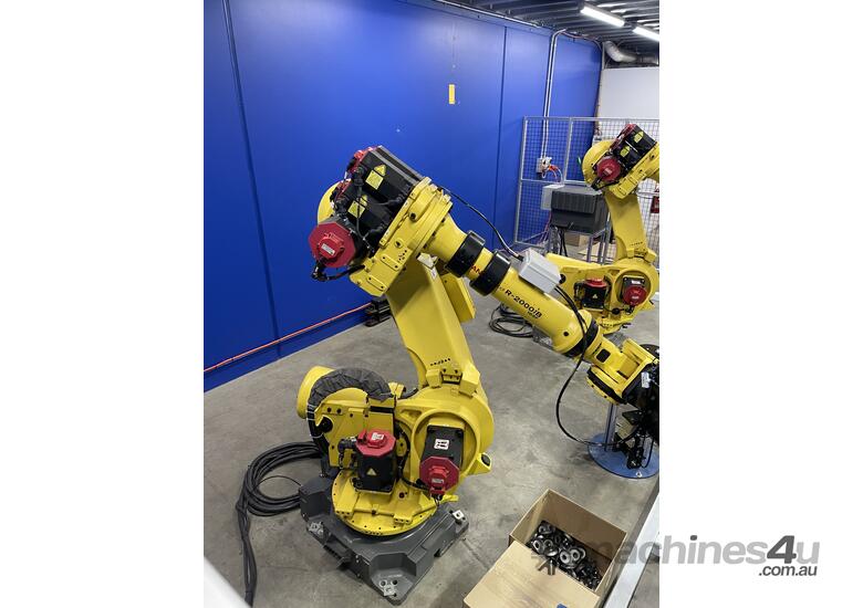 caption Fanuc 165ib Metal Spinning Robot cell - Boost Efficiency and Precision Today!