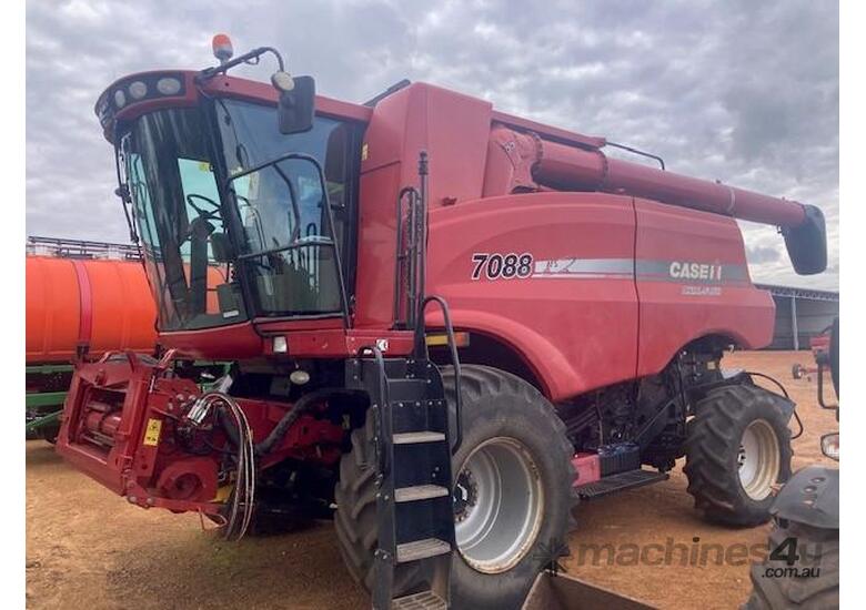 caption 2010 CASE IH 7088 HARVESTER