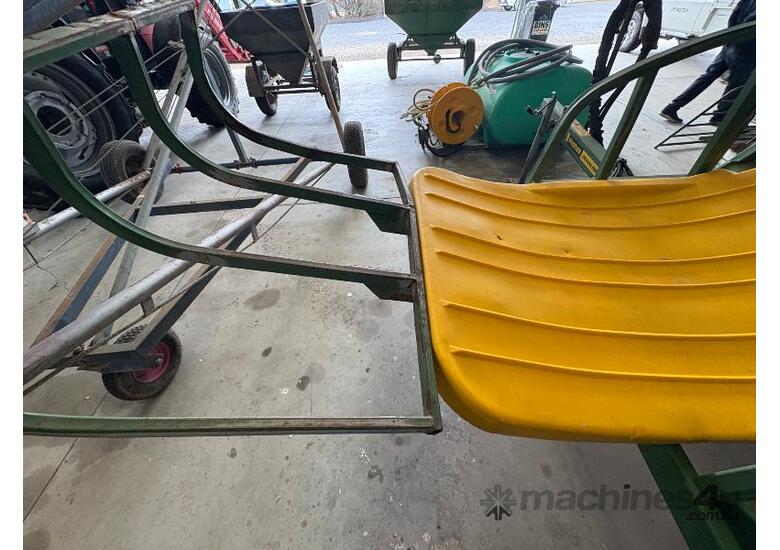 caption HUSTLER 4000 ROUND BALE FEEDER