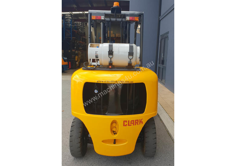 caption Clark 5000kg LPG forklift with 5000mm three stage mast and dual wheels