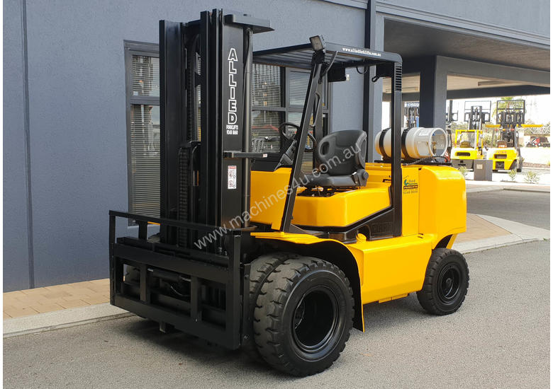 caption Clark 5000kg LPG forklift with 5000mm three stage mast and dual wheels