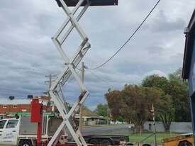 Scissor lift battery and petrol - picture0' - Click to enlarge