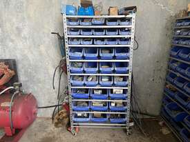3 Portable Storage Shelves With Contents - picture0' - Click to enlarge