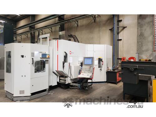 caption Hermle C42U Dynamic 5 axis CNC Vertical machining Centre with 6-station pallet pool.