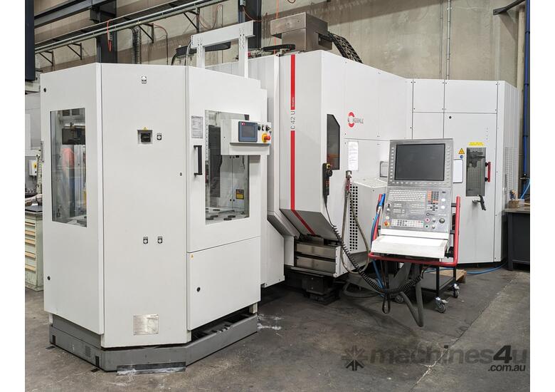 caption Hermle C42U Dynamic 5 axis CNC Vertical machining Centre with 6-station pallet pool.
