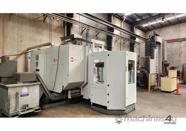 caption Hermle C42U Dynamic 5 axis CNC Vertical machining Centre with 6-station pallet pool.