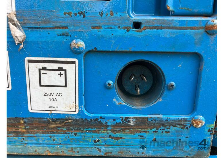 caption 2010 Genie GS-2632 Scissor Lift (Electric)