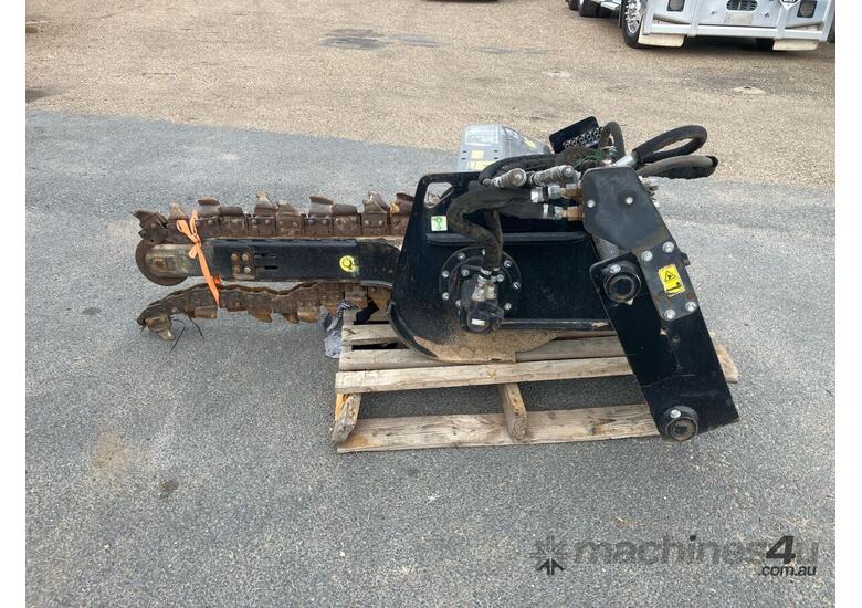 caption SKID STEER TRENCHER ATTACHMENT