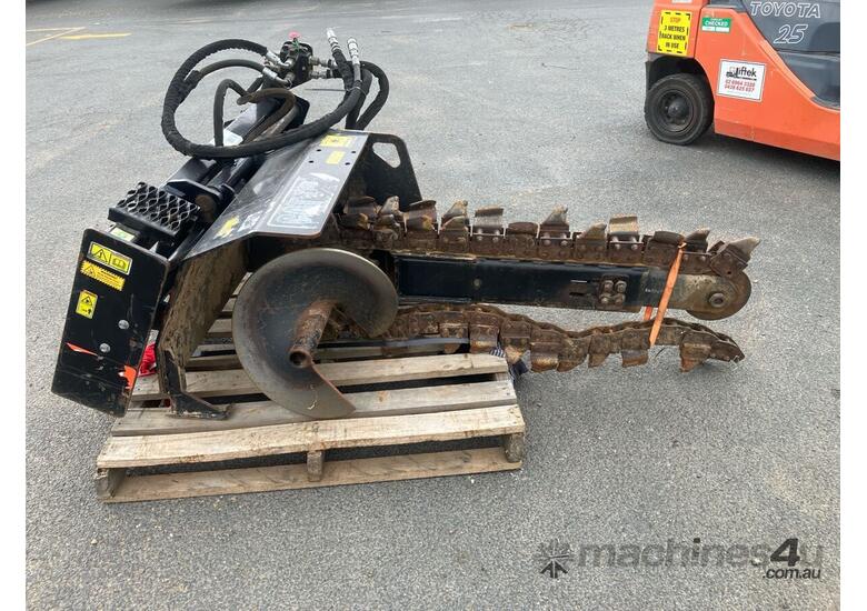 caption SKID STEER TRENCHER ATTACHMENT