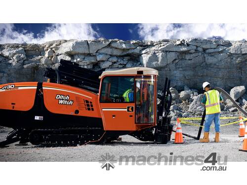 Ditch Witch AT30, 30k lbs rock drill