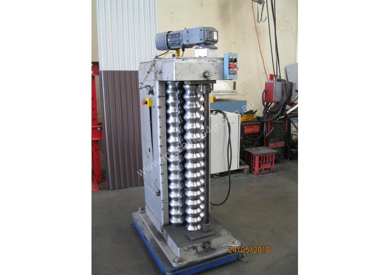 caption Hawke Vertical CNC Corrugated Curving Rolls