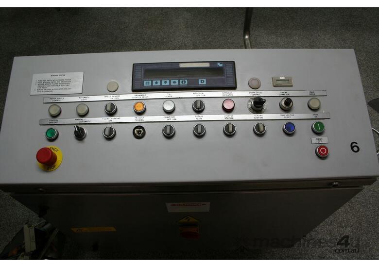 caption Fully Automatic Vials Filling & Closing Machine
