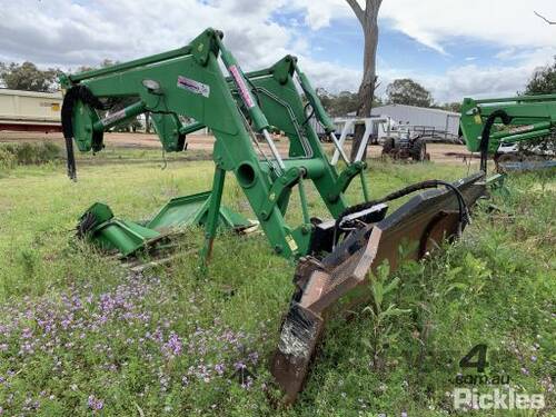 McCormick MC 180 front end loader attachment with silage blade. For further info contact Aaron Wilso