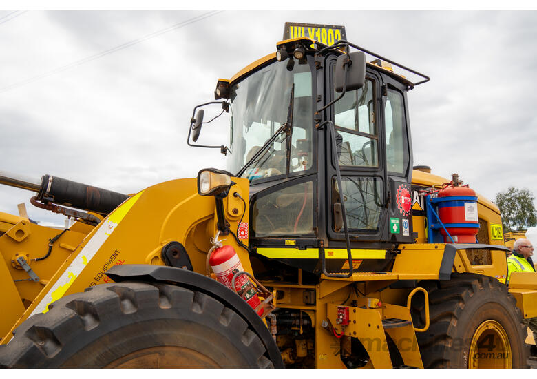 caption 2012 Caterpillar 930K Wheel Loader inc Bucket, Hitch & Fire Supression