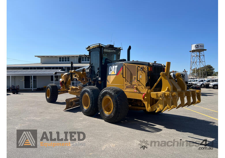 caption 2012 Caterpillar 14M Motor Grader
