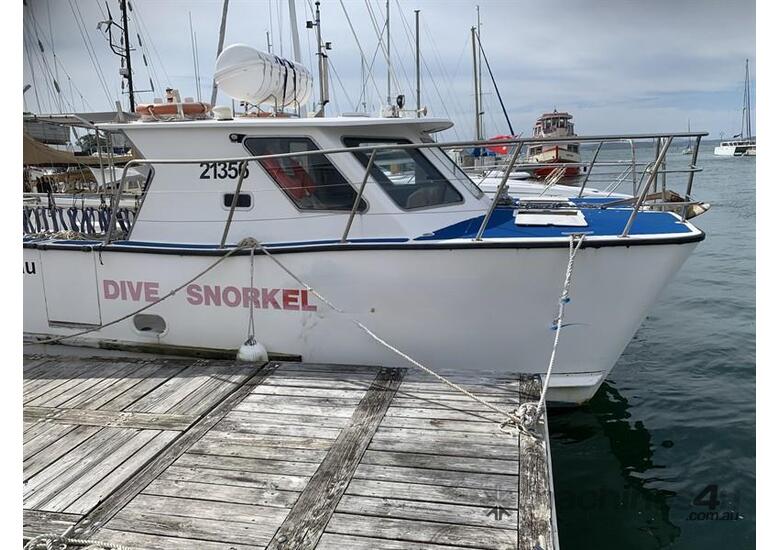 caption TOMAREE CUSTOM BUILT CATAMARAN DIVE VESSEL