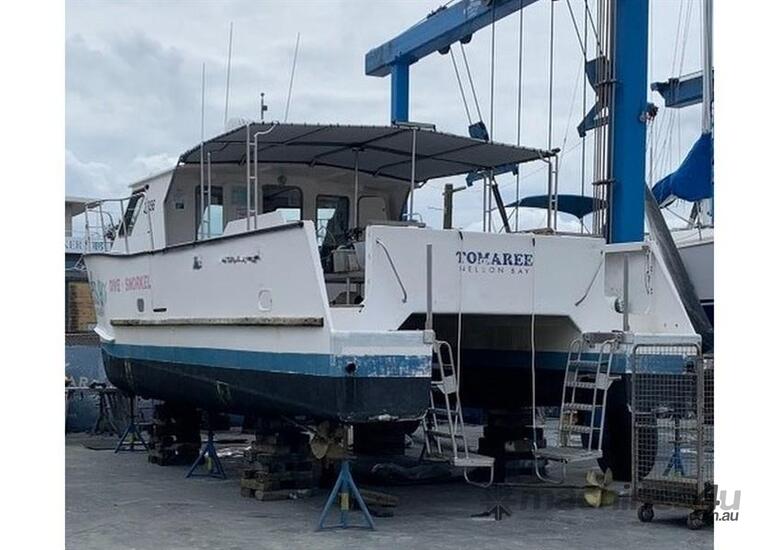 caption TOMAREE CUSTOM BUILT CATAMARAN DIVE VESSEL