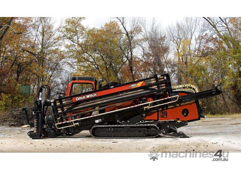 caption Ditch Witch AT60, 60k lbs rock drill