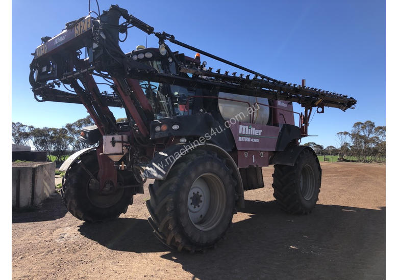 caption Miller Nitro 4365 Boom Spray Sprayer