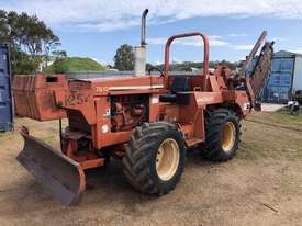7610 trencher / plow , 84 hp , 1300 hrs , 4 wheel steer , front weights - picture0' - Click to enlarge