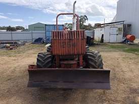 7610 trencher / plow , 84 hp , 1300 hrs , 4 wheel steer , front weights - picture0' - Click to enlarge