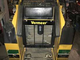 Vermeer mini skid steer with many attachments - picture0' - Click to enlarge