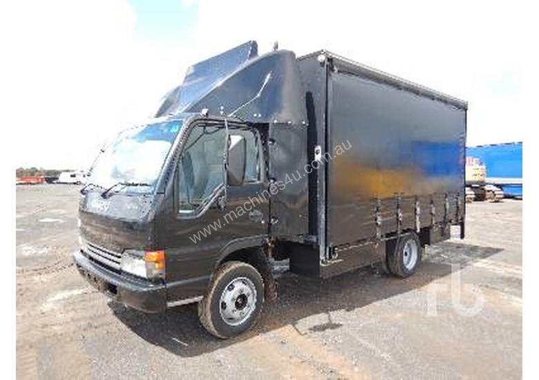 caption ISUZU NPR Tautliner Truck