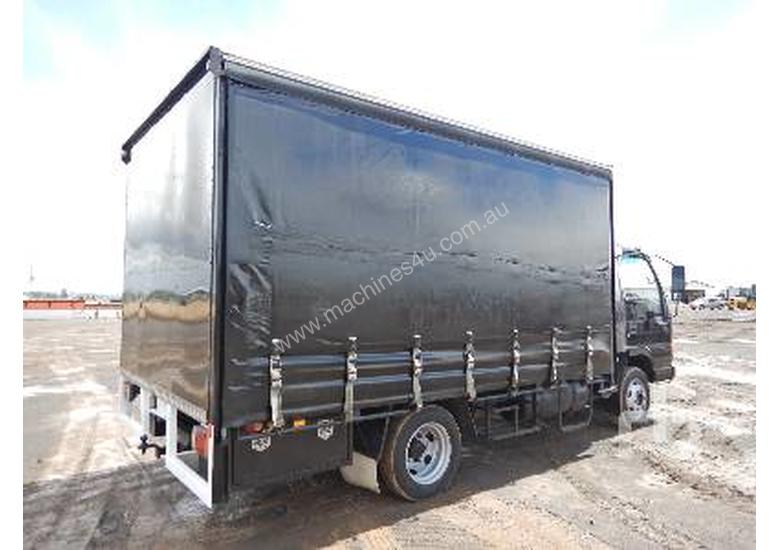 caption ISUZU NPR Tautliner Truck