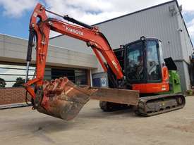 2016 KUBOTA U55-4 EXCAVATOR WITH LOW 2210 HOURS, FULL CAB, ANGLE BLADE, HITCH AND FULL BUCKET SET. - picture0' - Click to enlarge