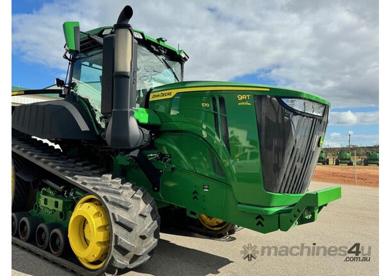 caption 2022 John Deere 9RT 570 Track Tractors