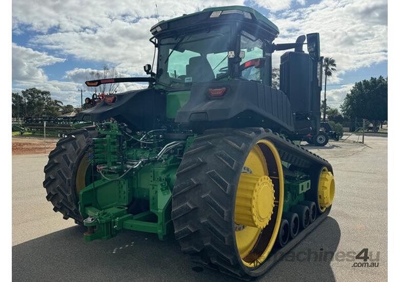 caption 2022 John Deere 9RT 570 Track Tractors