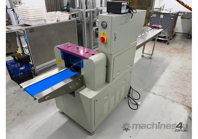 caption Flow Wrapper Packaging Machine - Food Grade, Generic Flow Wrap And Clear Cellophane Available!
