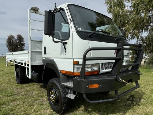 Mitsubishi Fuso Canter 4x4 Single Cab Traytop Truck.