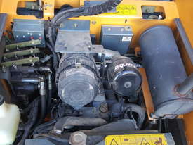 Used A/C Cab, T-Bar Steering, 4 in 1 Bucket Mustang 2044 Skid Steer - picture2' - Click to enlarge