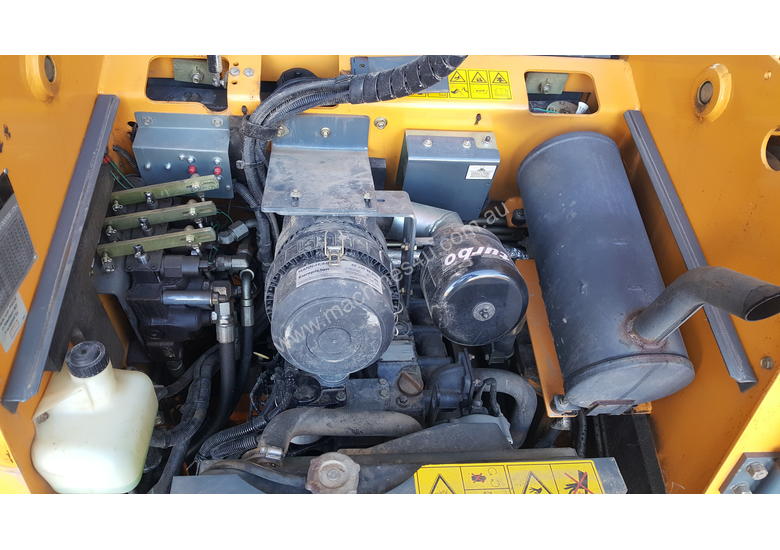 caption Used A/C Cab, T-Bar Steering, 4 in 1 Bucket Mustang 2044 Skid Steer