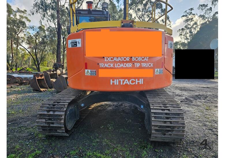caption 2014 HITACHI ZX135US-3 WITH ATTACHMENTS