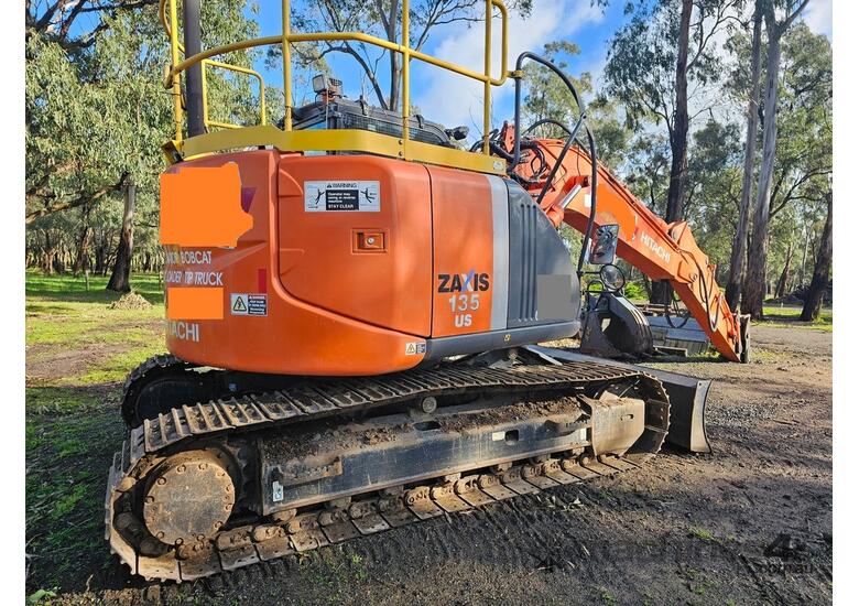 caption 2014 HITACHI ZX135US-3 WITH ATTACHMENTS